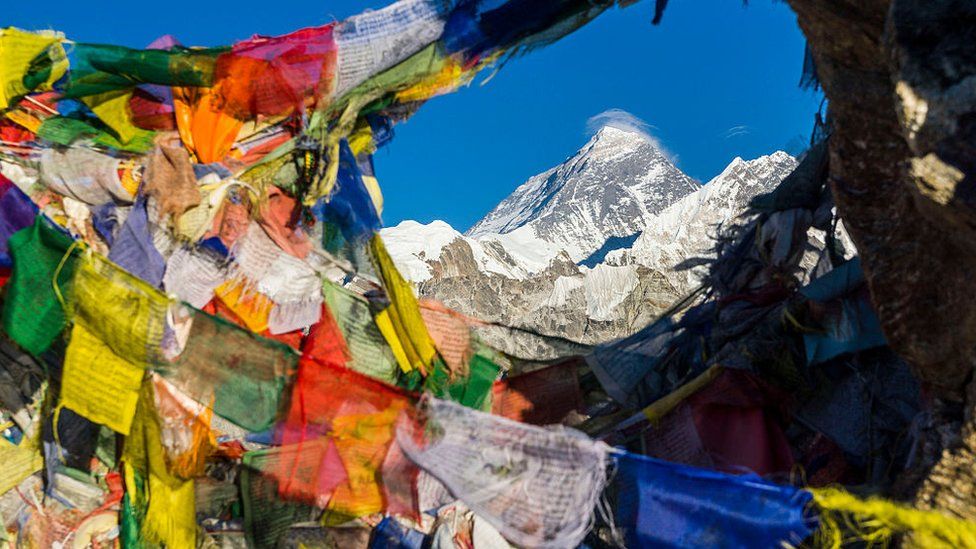 how many people climb everest each year