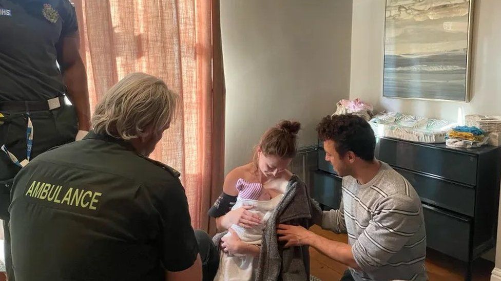 Family with baby after birth