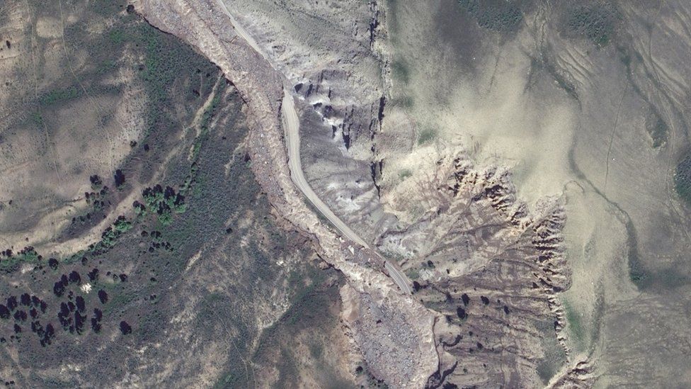 Satellite imagery inside Yellowstone National Park shows a washed out road