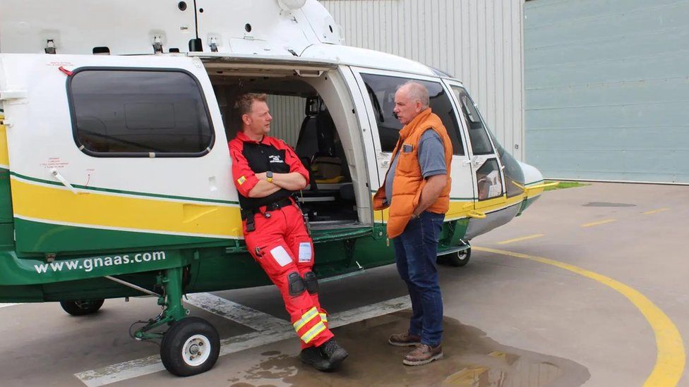 Paramedic Andy Dalton with Phil Duggan