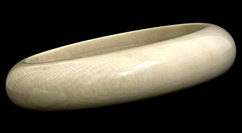Ivory bangle listed for sale on Ebay