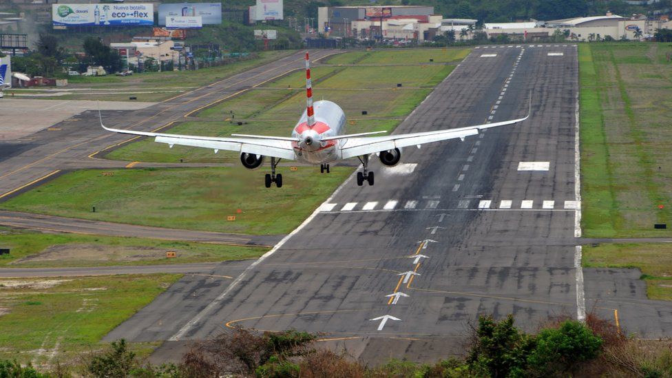 An airliner lands at the Toncontin international airport in Tegucigalpa