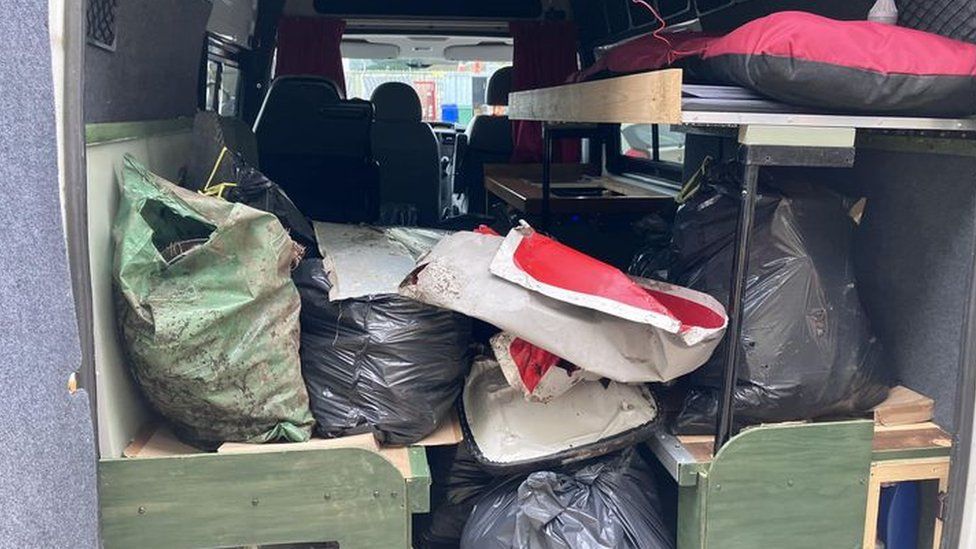 Bags of waste in a van