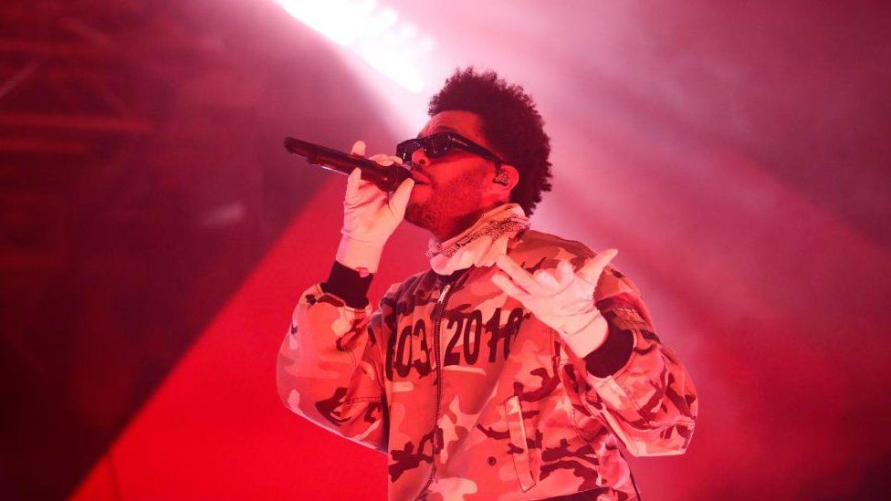 Abel Tesfaye, formally known as 'The Weeknd' performing on stage