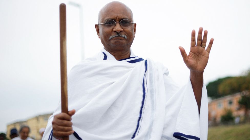 A man dressed as Mahatma Gandhi participating in the Salt March, Durban - Sunday 7 May 2023