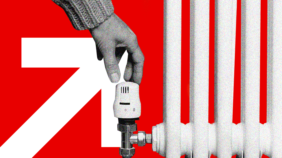 A hand touches a radiator controls with a red background