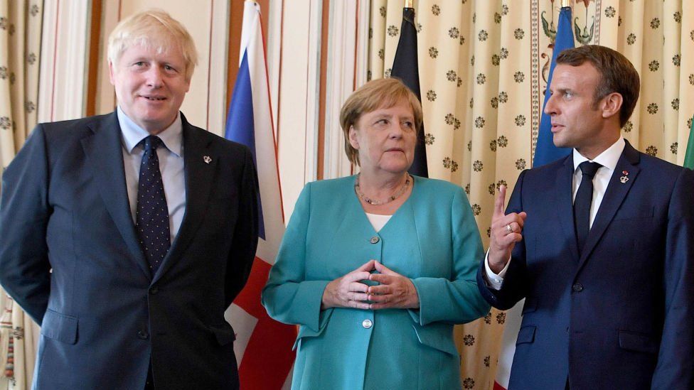 Boris Johnson, German Chancellor Angela Merkel and French President Emmanuel Macron