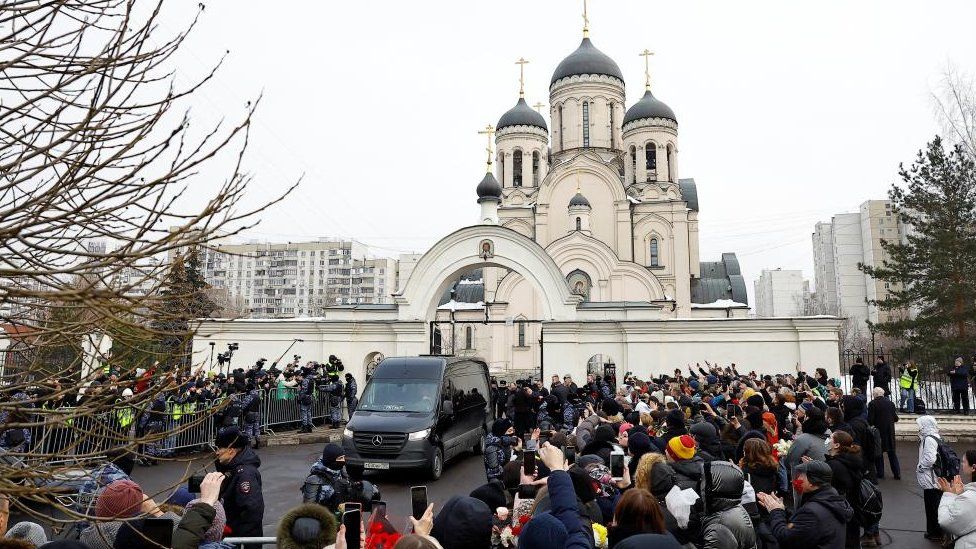 A hearse, said to be carrying the body of Russian opposition politician Alexei Navalny, is parked outside the Soothe My Sorrows church before a funeral service and farewell ceremony in Moscow, Russia, March 1, 2024