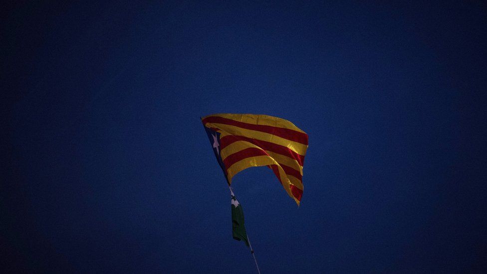 A Catalan independence flag waves during a protest in Barcelona, 2 November