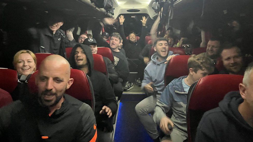Liverpool fans in the coach provided by Simon Wilson