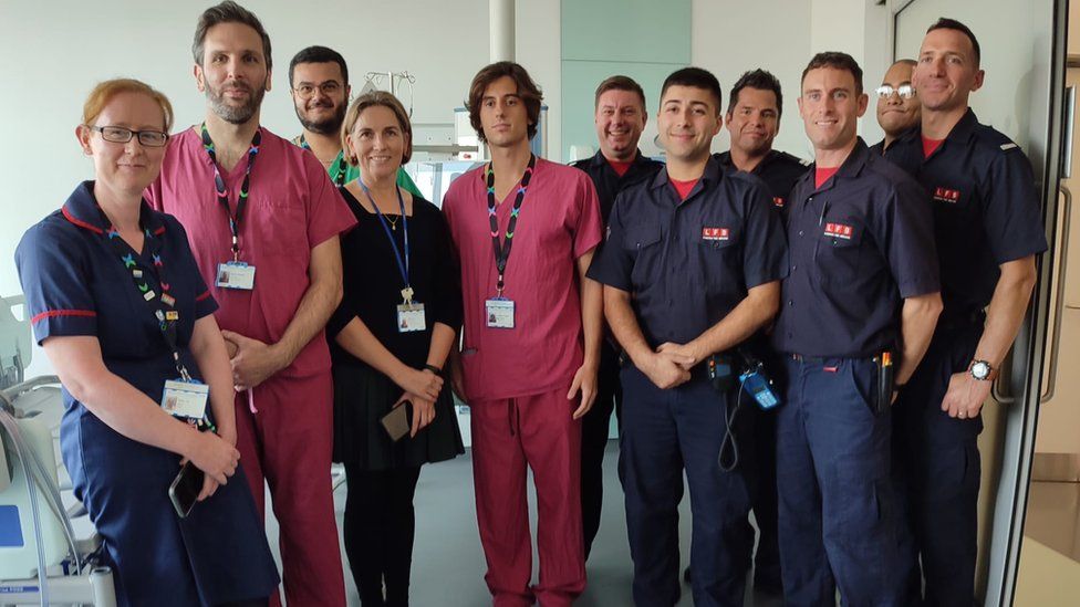 Staff at Chelsea and Westminster NHS Hospital Burns Unit with London Fire Brigade crew