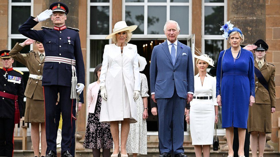 King Charles III and Queen Camilla plant a tree to mark the coronation at Hillsborough Castle