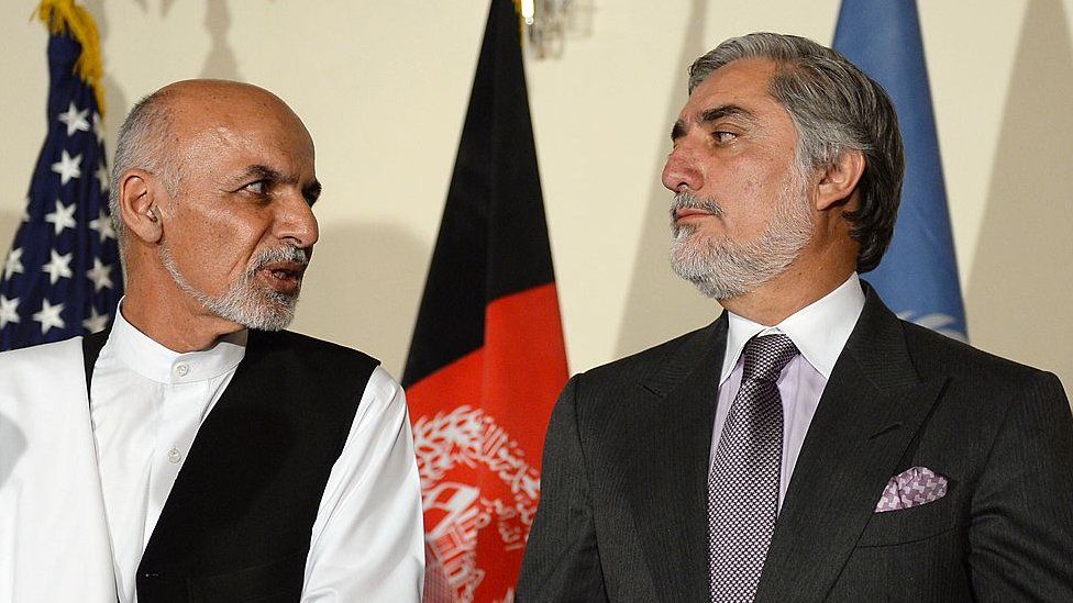 Afghan presidential candidates Ashraf Ghani (L) and Abdullah Abdullah
