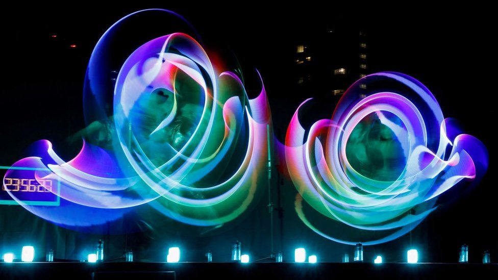 Entertainers perform during a countdown event for the 2023 new year celebrations in Tokyo