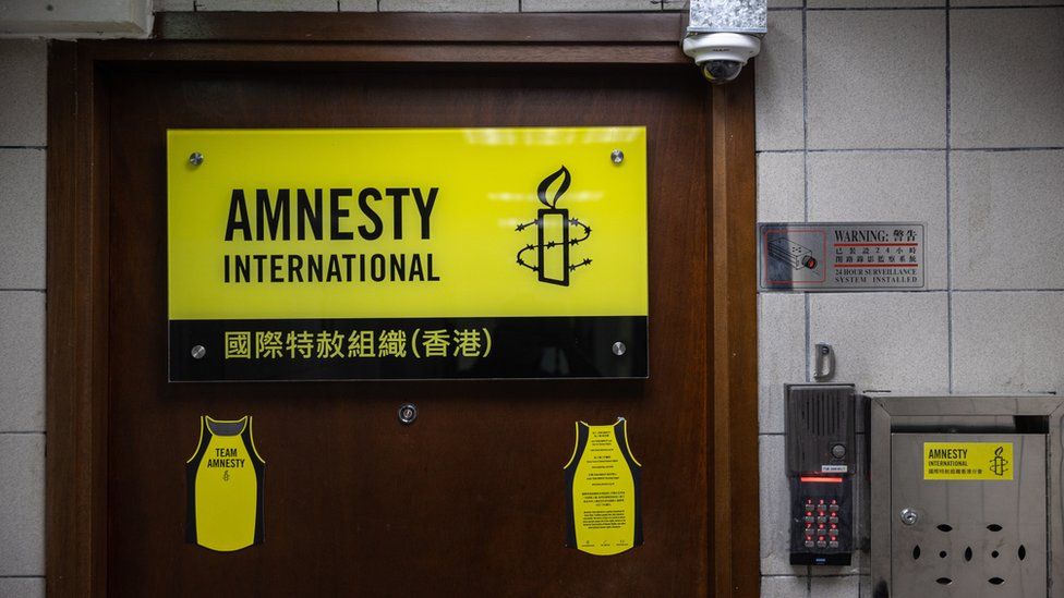 Amnesty International sign on office door in Hong Kong