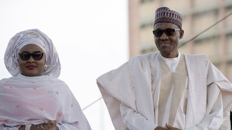 President Muhammadu Buhari arrives with his wife Aisha