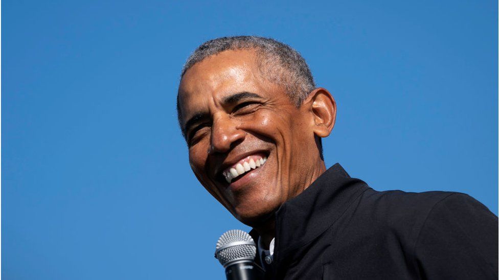 Barack Obama with blue sky background.