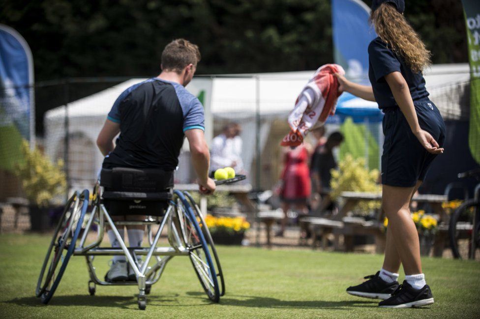 Alfie Hewett and ball girl