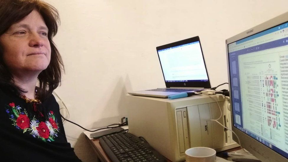 Svitlana Krakovska at her desk