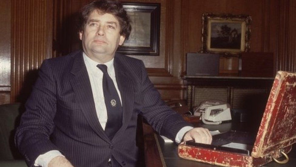 Nigel Lawson with the red budget box