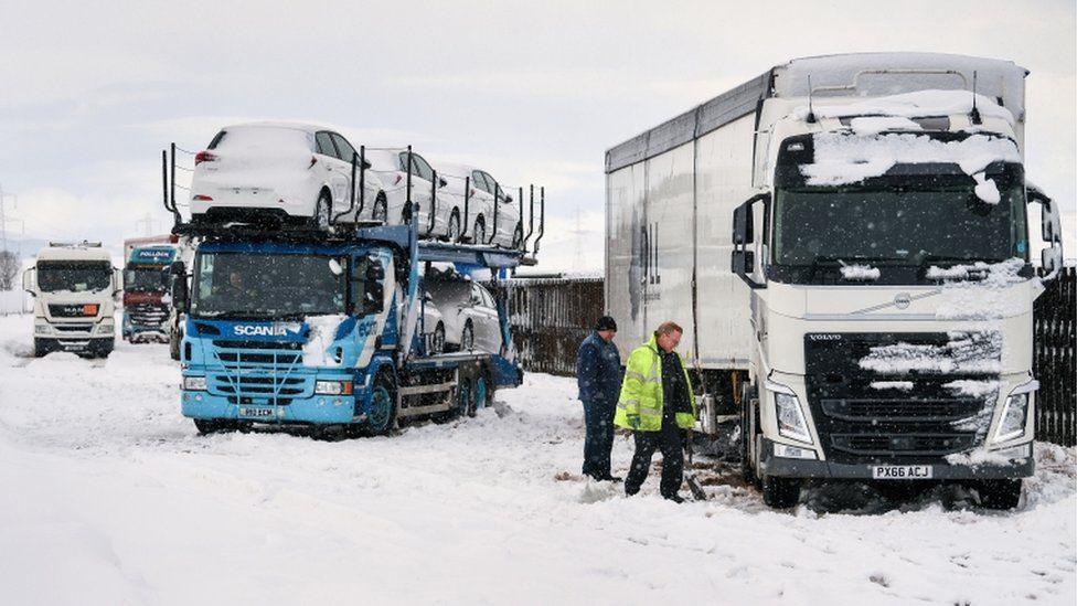 Trucks back up at Red Moss truck stop off the M74, following motorist spending the night stranded on the motorway on January 16, 2018 in Crawford, Scotland. Mountain rescue teams spent the night helping drivers following heavy snowfall in the Dumfries and Galloway region. (Photo by Jeff J Mitchell/Getty Images)