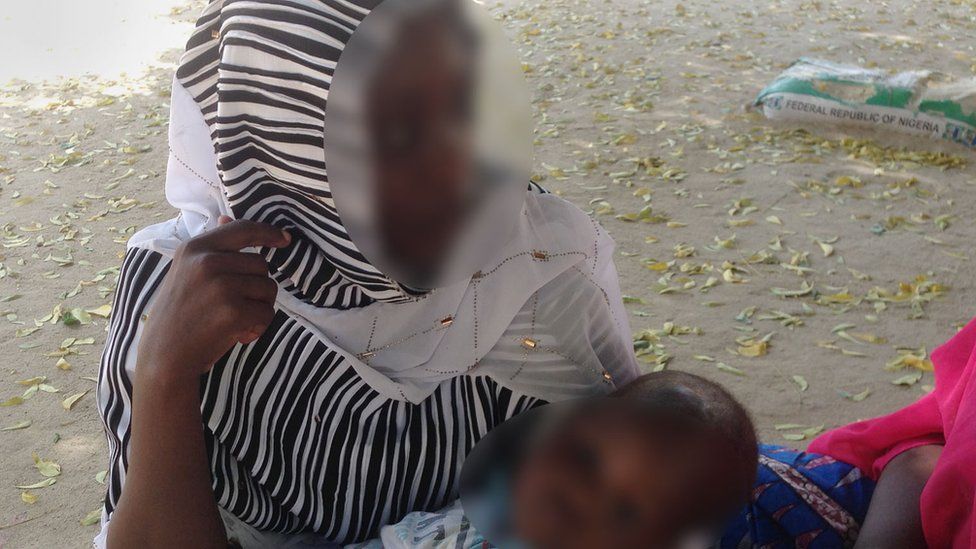 Boko Haram wife with child
