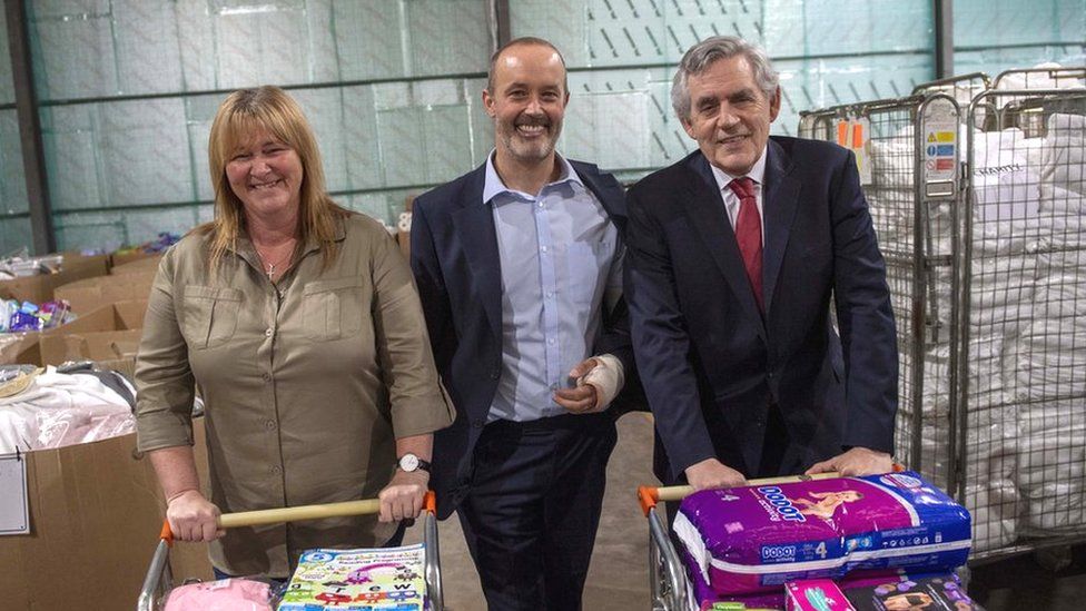 Pauline Buchan, John Boumphrey and Gordon Brown at the Amazon warehouse in Lochgelly