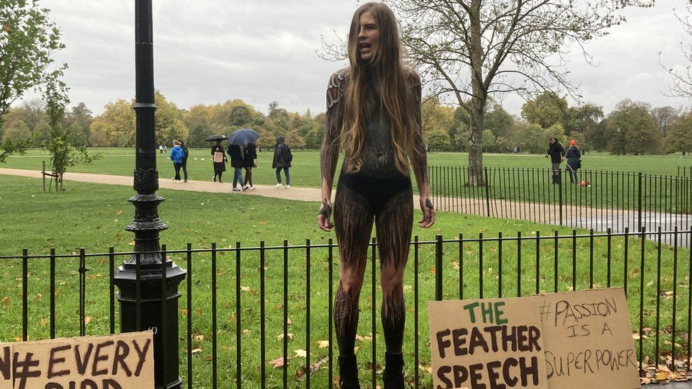 Woman Marches Through London In Body Paint To Save Birds BBC News Woman Marches Through London In Body Paint To Save Birds BBC News