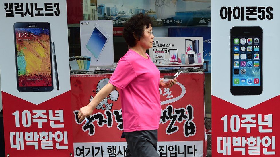 Woman walking in Seoul street