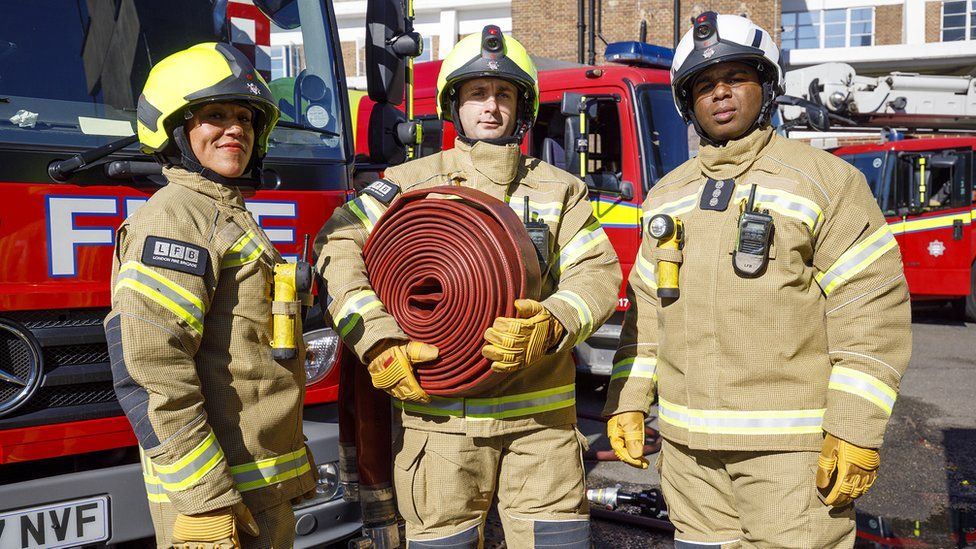 London Fire Brigade officers and dogs' new golden kit BBC News