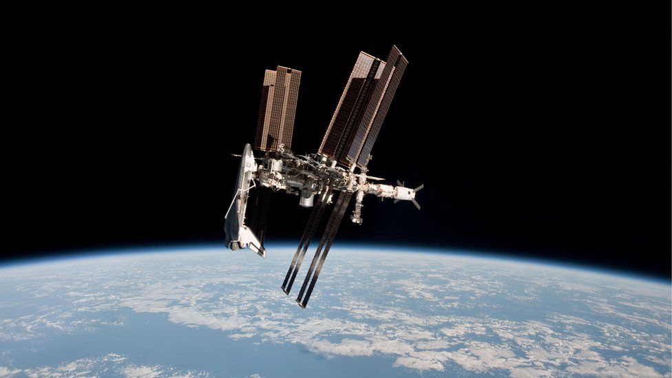 In this handout image provided by the European Space Agency (ESA) and NASA, the International Space Station and the docked space shuttle Endeavour orbit Earth during Endeavour's final sortie on May 23, 2011.