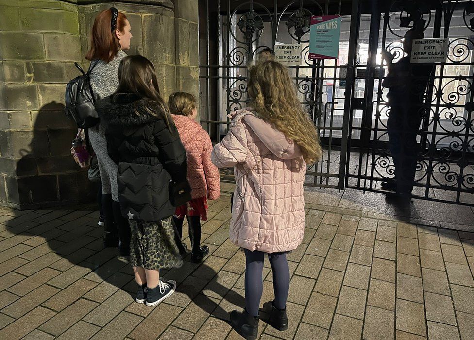 A family arrived for a gig at the Town Hall but it was cancelled after buildings were locked down