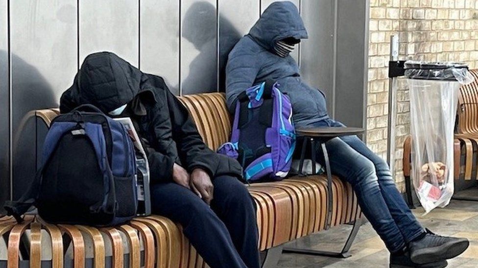 Two rough sleepers at Paddington station