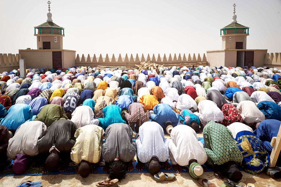 Muslims praying at a new mosque in Djenne, Mali - Friday 28 February 2020