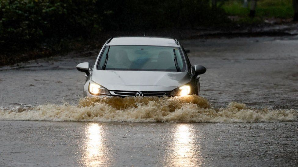 Car in flood in Scotland