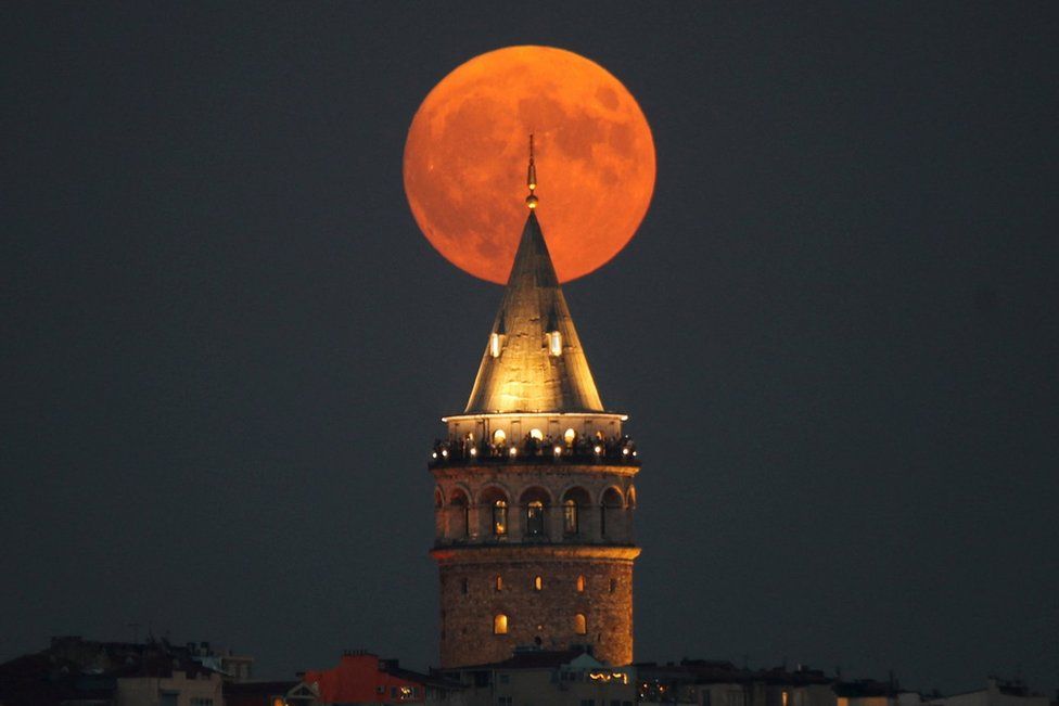 The blue supermoon is seen over the Galata Tower in Istanbul, Turkey. Photo: 30 August 2023