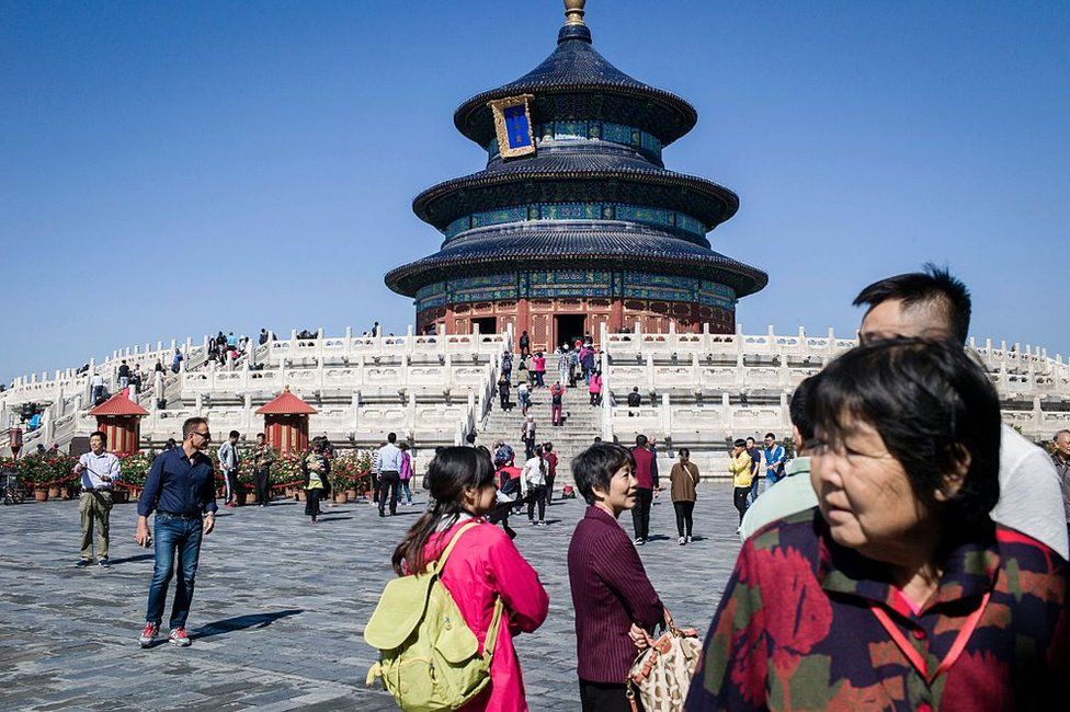 Tourists visit Temple of Heaven in Beijing on 28 September 2016 ahead of Golden Week, a week-long holiday that coincides with the anniversary of the founding of the People's Republic of China which falls on October 1.