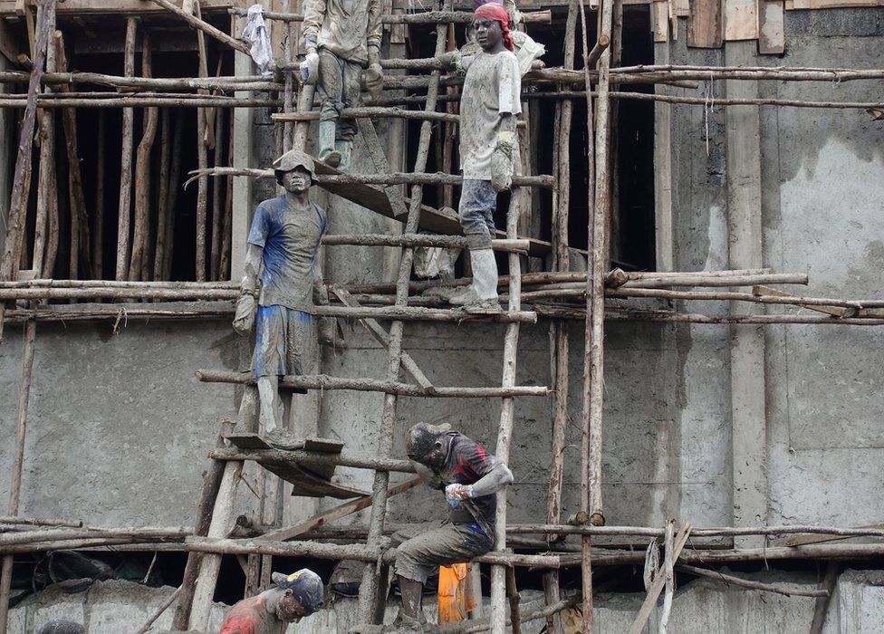 Men work in a construction site in Goma, the capital of North Kivu, eastern Democratic Republic of Congo, April 4, 2018