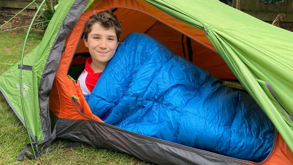 Max Woosey in his tent