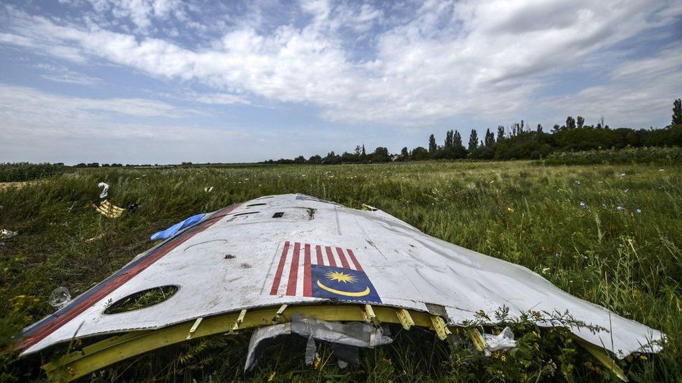 A piece of the wreckage of the Malaysia Airlines flight MH17 is pictured in a field near the village of Grabove, in the region of Donetsk on July 20, 2014.