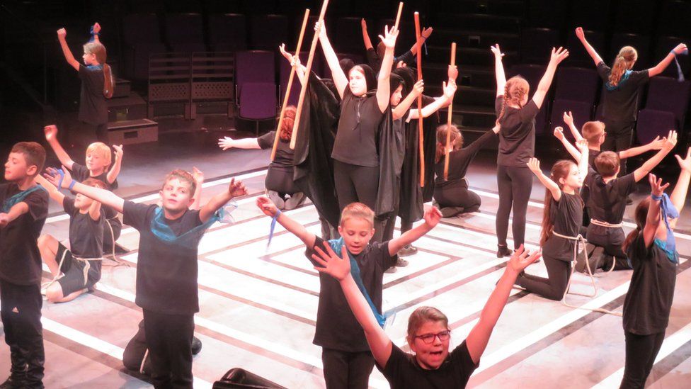 10 year olds performing an extract from The Tempest around the theme of Prospero's magic and powers at the New Vic Theatre in Newcastle-under-Lyme