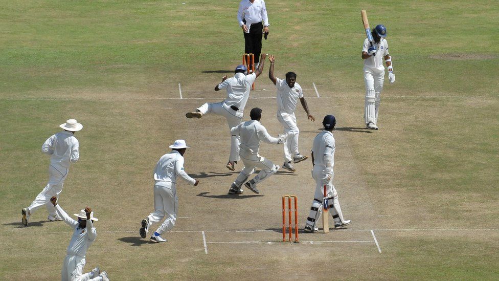 Muralitharan celebrates a wicket