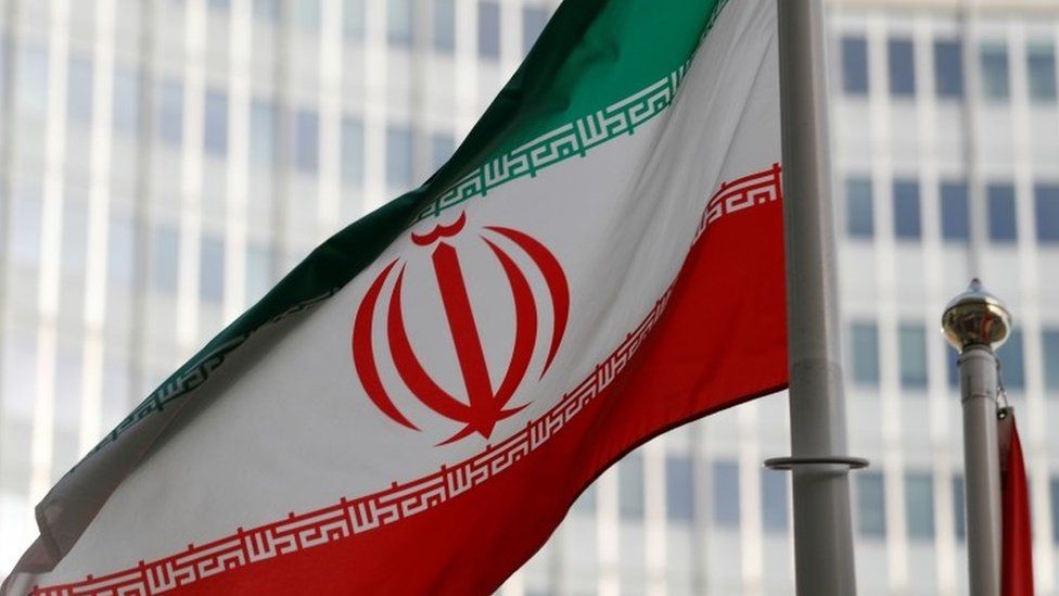 Iran's national flag flutters in front of the International Atomic Energy Agency's headquarters in Vienna, Austria. File photo