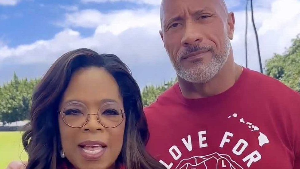Hawaii wildfires: Oprah and The Rock pledge direct payments to victims in Maui - BBC