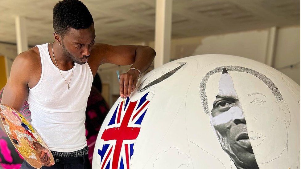 Artist Emmanuel Unaji, with his work 'Expanding Soul