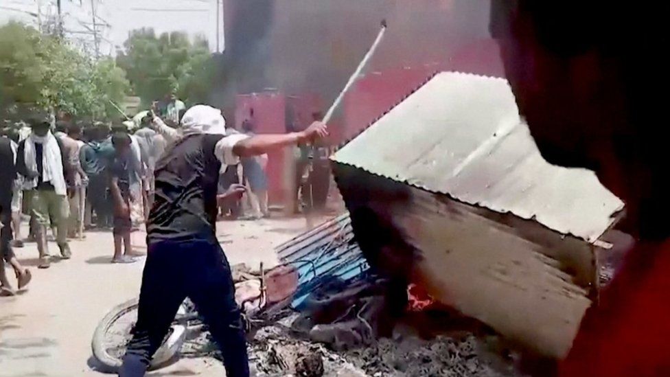 Furniture and other belongings of a church is set on fire, in Jaranwala, Pakistan