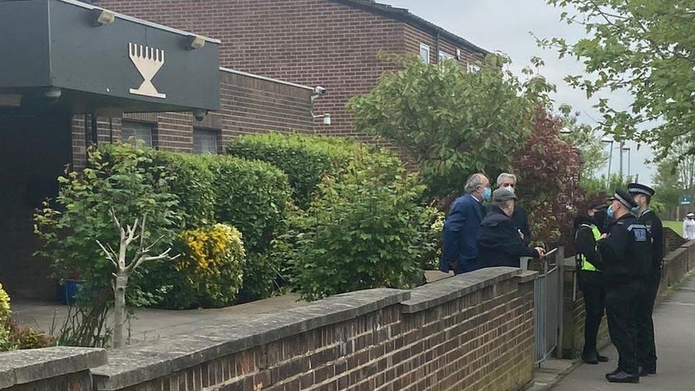 Police officers outside Chigwell and Hainault Synagogue