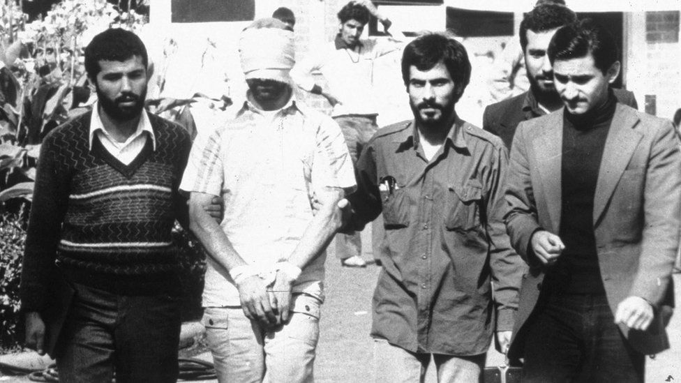 An American hostage is shown before the media by his Iranian captors in this 1979 file photo