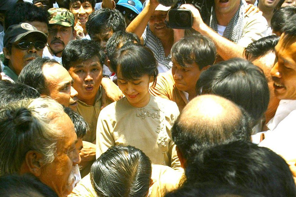Aung San Suu Kyi, swarmed by supporters on her release after 19 months of house arrest in 2002