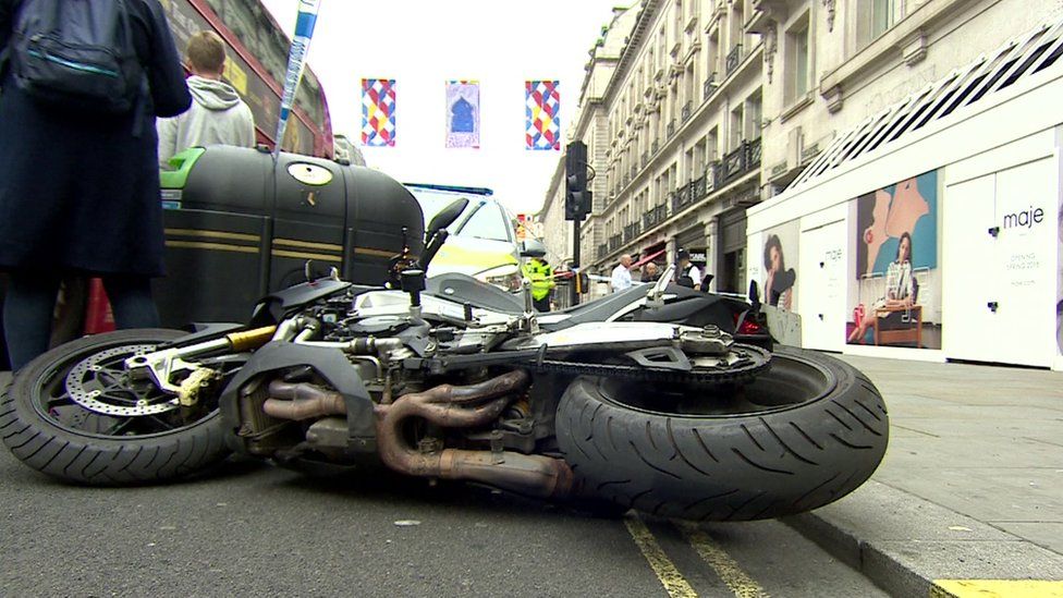 Motorbike on its side in Regent Street